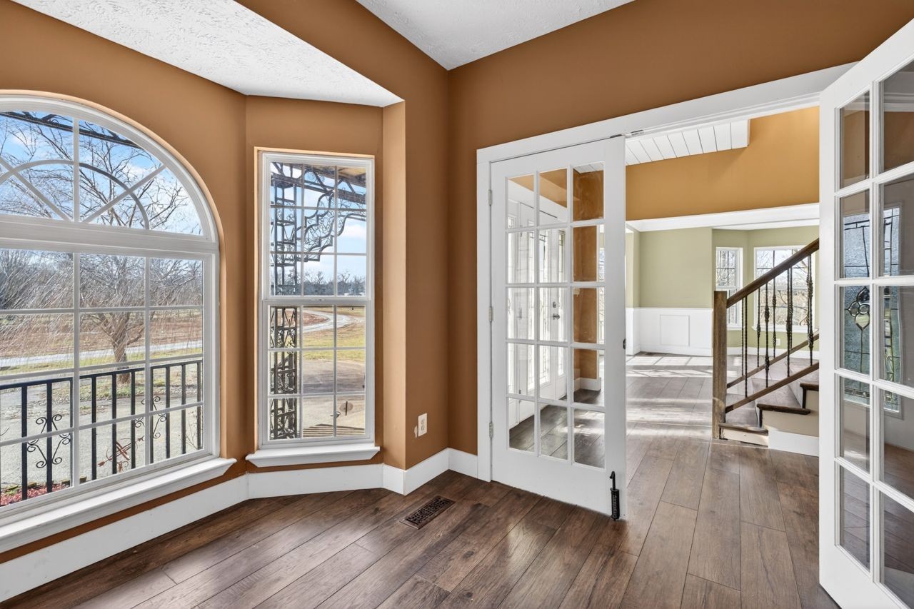 1463 B Vesta Road Lebanon, TN 37090 - Photo 13 of 86 a view of an entryway with wooden floor and windows