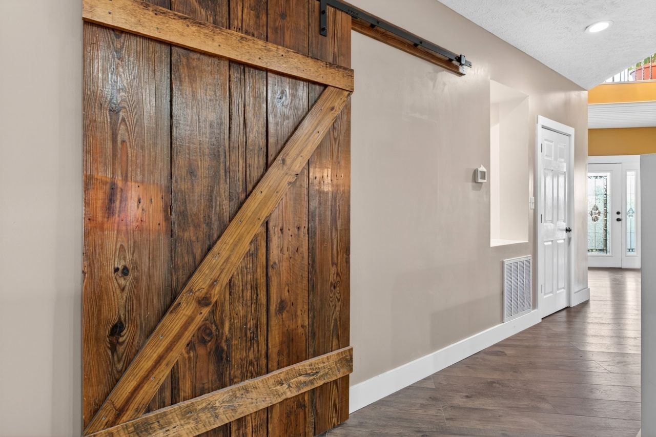 1463 B Vesta Road Lebanon, TN 37090 - Photo 31 of 86 a view of a hallway with wooden floor and staircase
