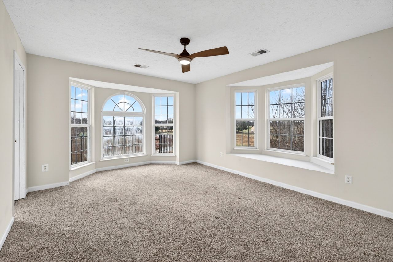 1463 B Vesta Road Lebanon, TN 37090 - Photo 48 of 86 a view of an empty room with a window and a kitchen