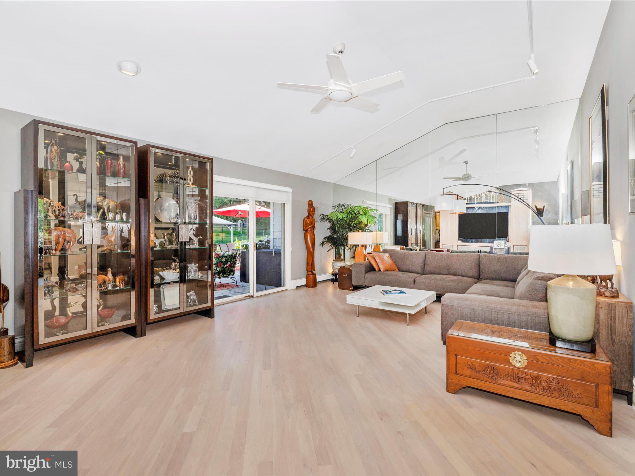 8207 Marcie Drive Baltimore, MD 21208 - Photo 13 of 67 a living room with furniture and wooden floor