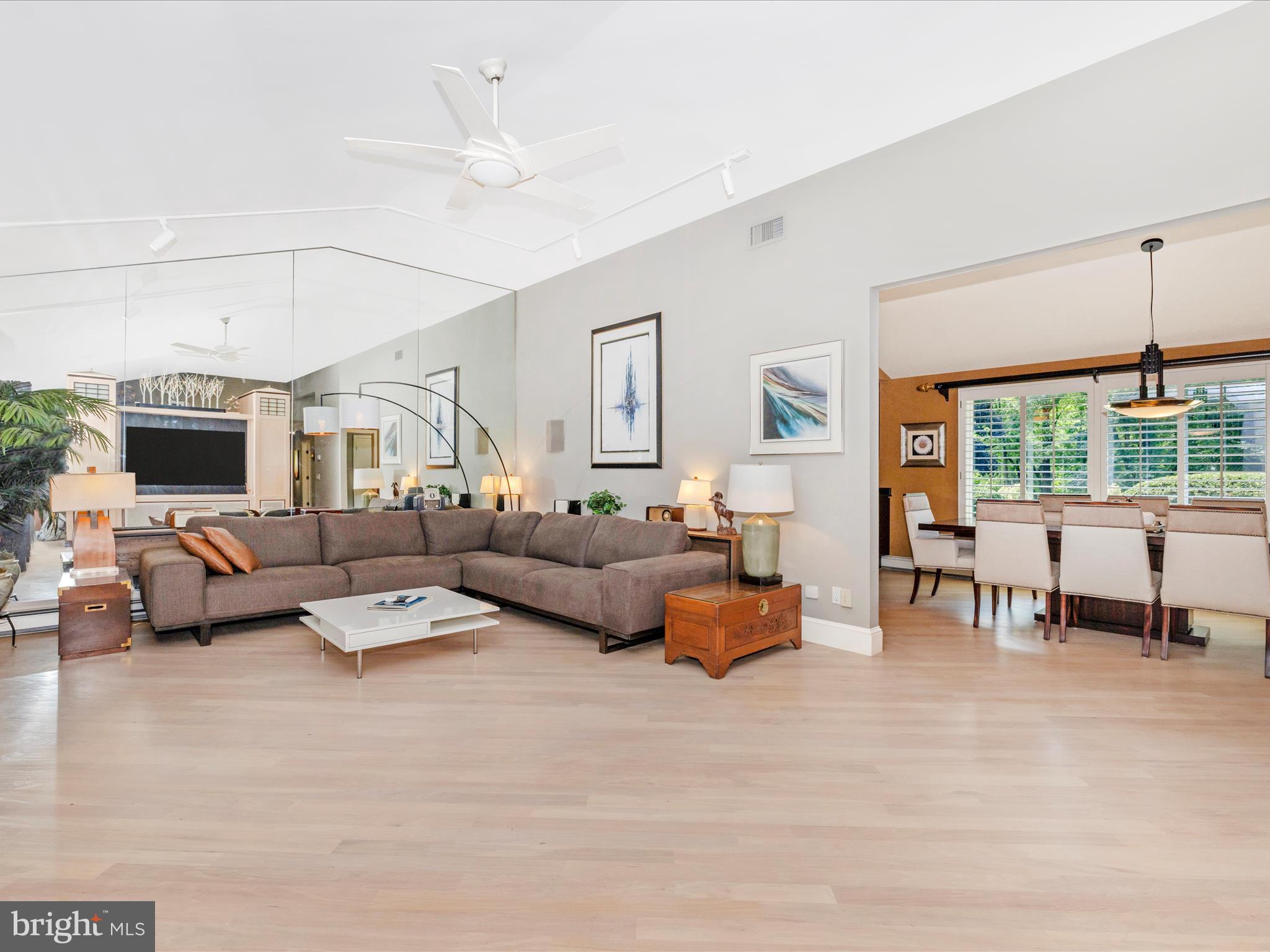 8207 Marcie Drive Baltimore, MD 21208 - Photo 14 of 67 a living room with furniture and a large window