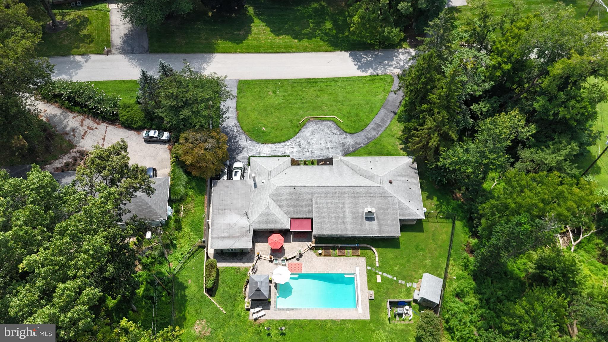 8207 Marcie Drive Baltimore, MD 21208 - Photo 2 of 67 an aerial view of a house with a yard basket ball court and outdoor seating