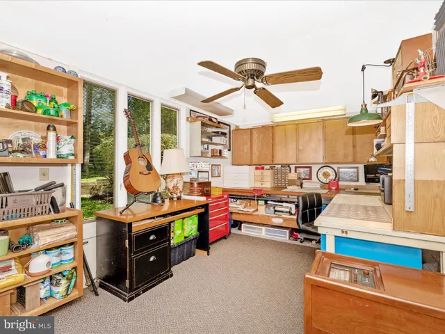 a bedroom with furniture and a bed