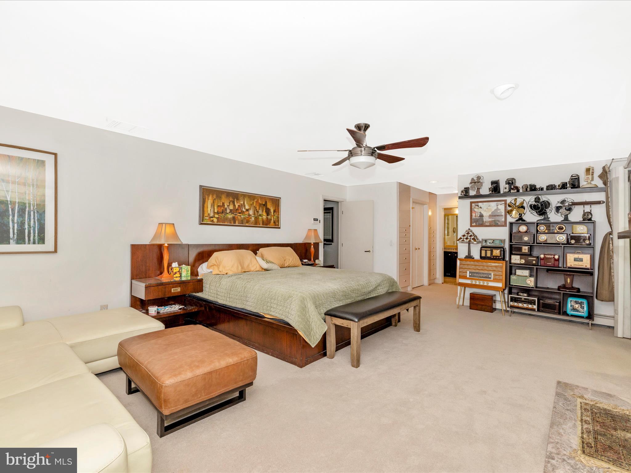 8207 Marcie Drive Baltimore, MD 21208 - Photo 37 of 67 a bedroom with furniture and a bed