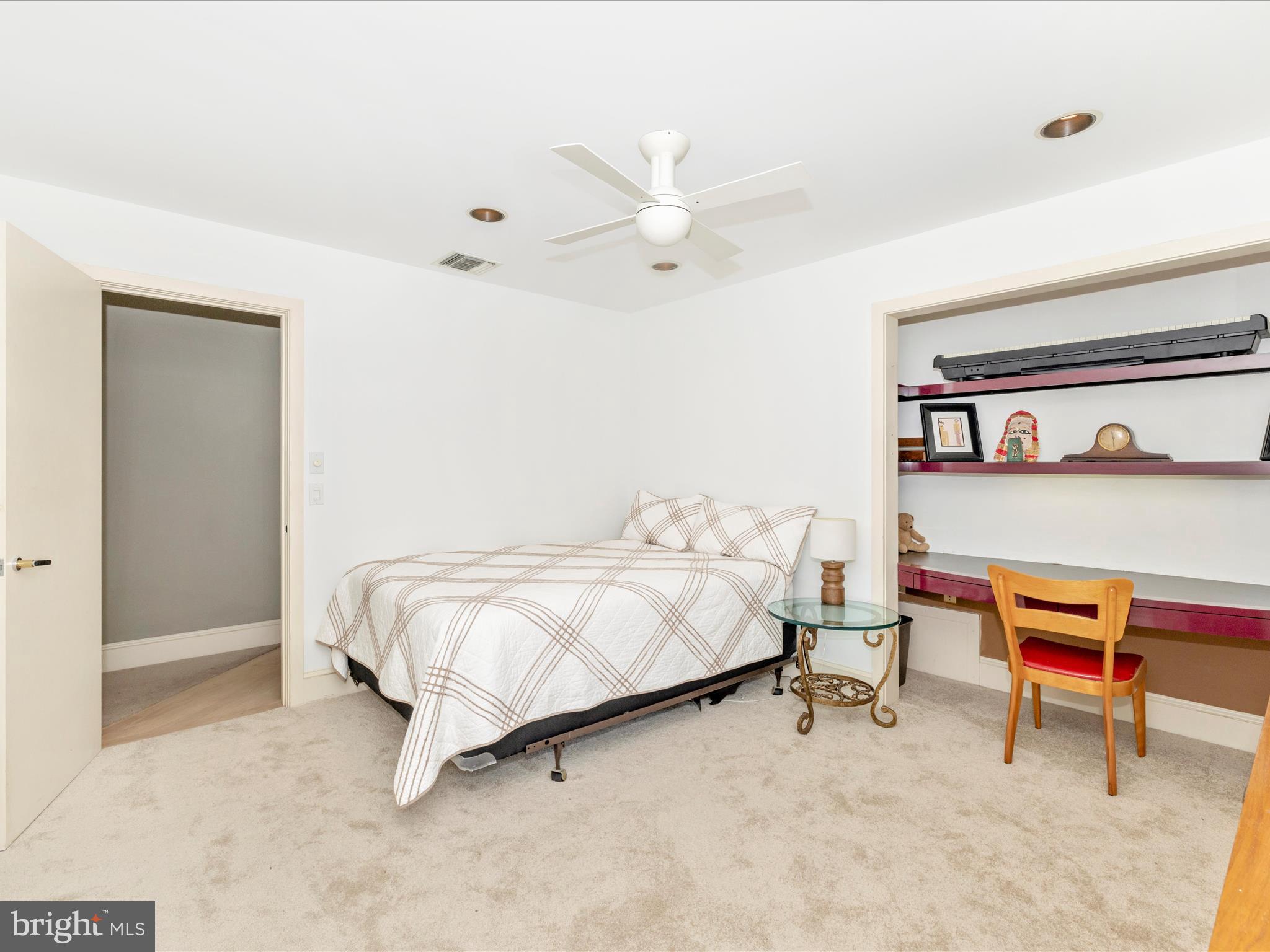 8207 Marcie Drive Baltimore, MD 21208 - Photo 44 of 67 a bed room with a bed and a chair