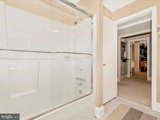 a view of a swimming pool with an outdoor space and seating area