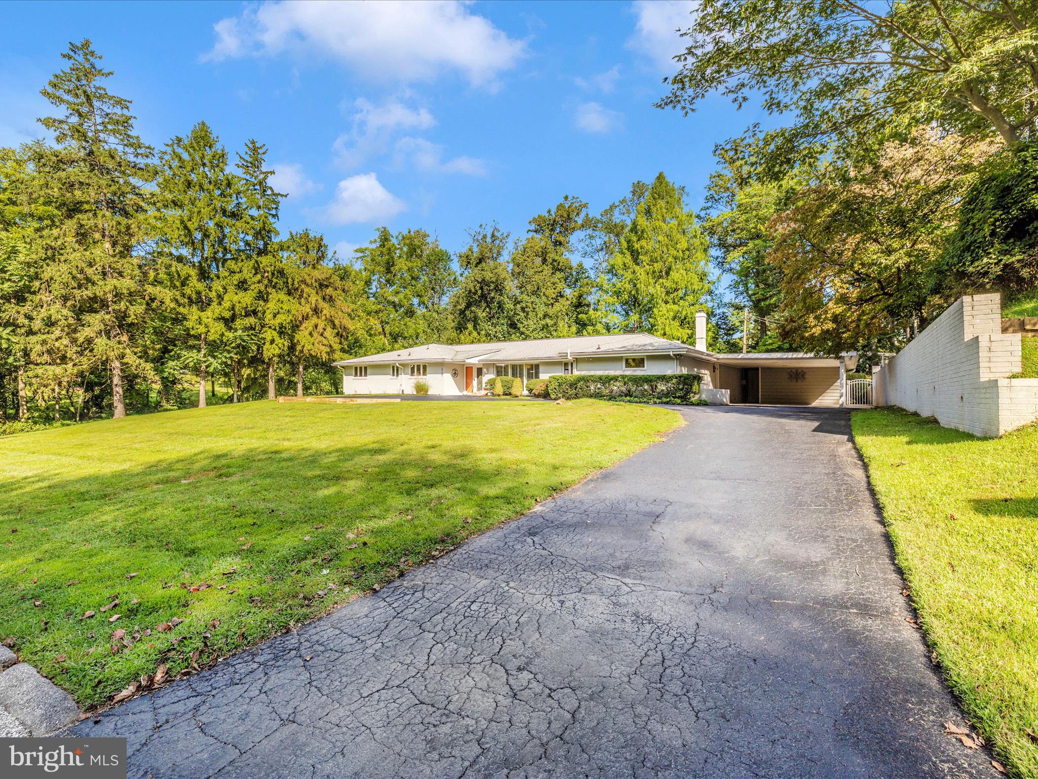 8207 Marcie Drive Baltimore, MD 21208 - Photo 65 of 67 a view of a swimming pool with an outdoor space and seating area
