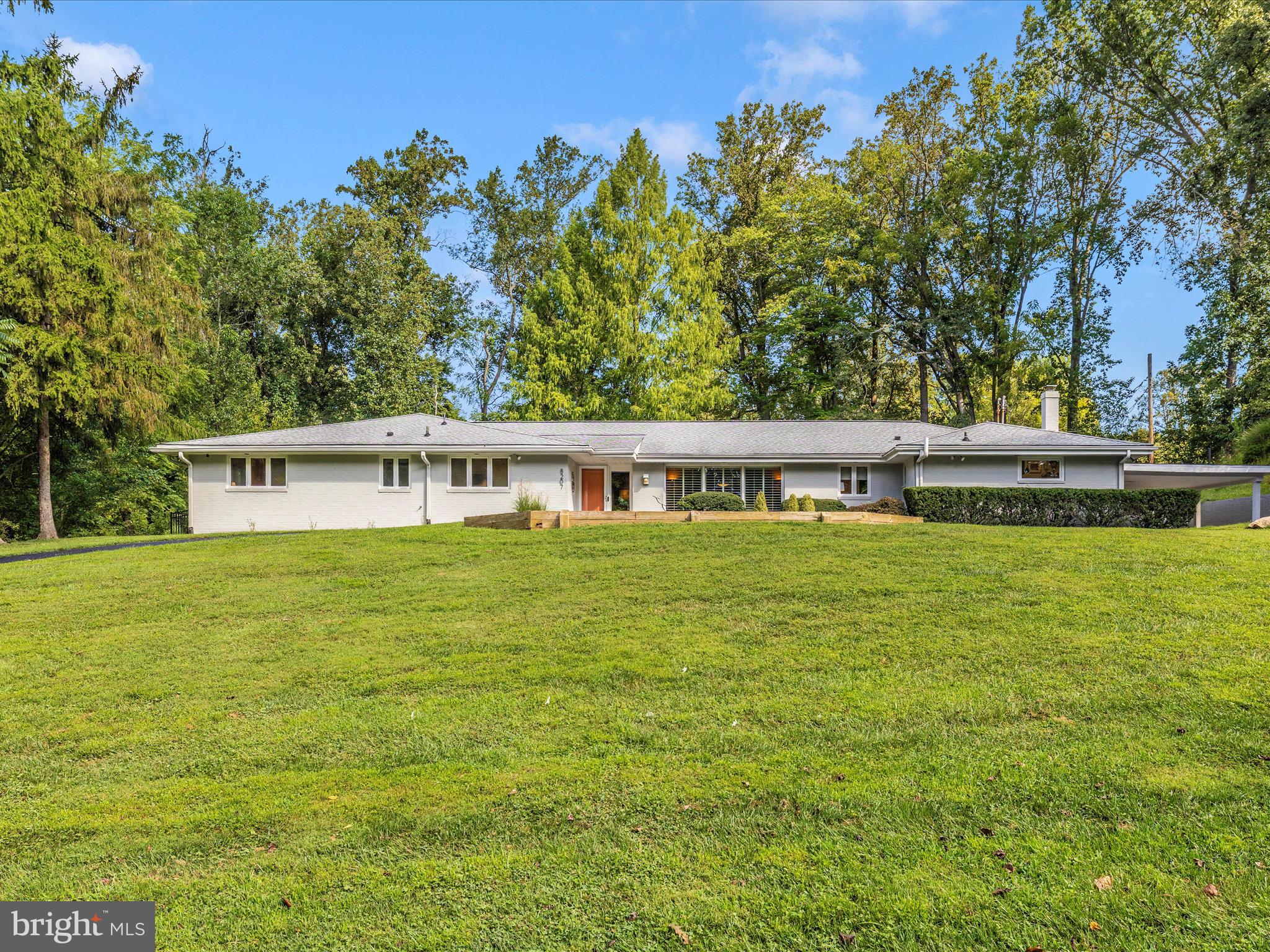 8207 Marcie Drive Baltimore, MD 21208 - Photo 67 of 67 a view of house with outdoor space and seating area