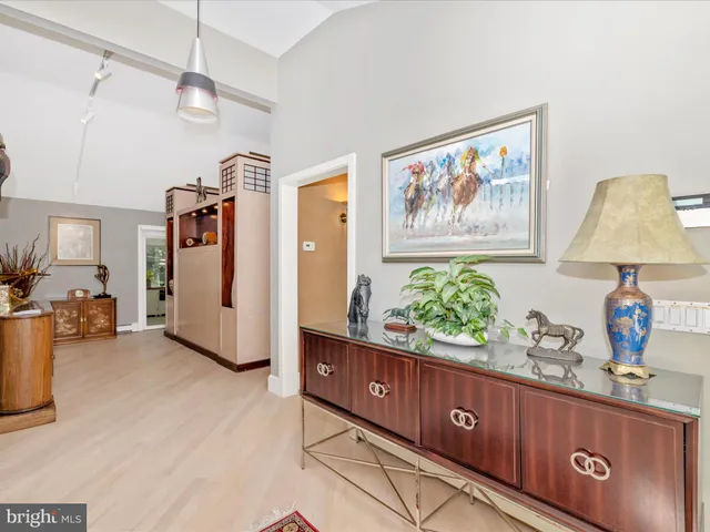 a dining room with furniture window wooden floor
