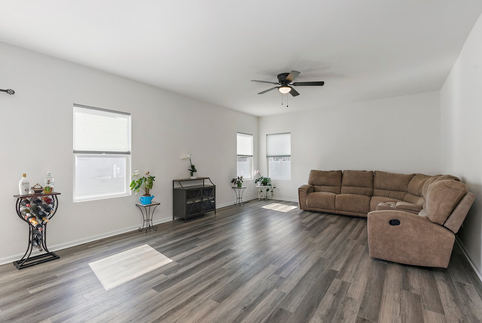 335 Snowdrop Lane Elgin, IL 60124 - Photo 11 of 25 a living room with furniture and a fireplace