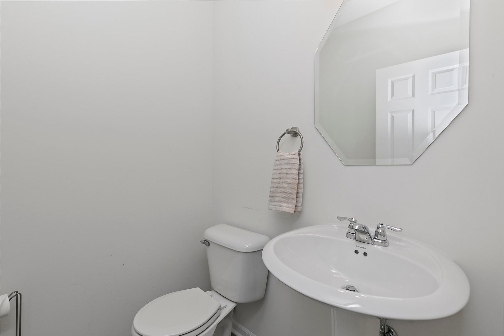 335 Snowdrop Lane Elgin, IL 60124 - Photo 12 of 25 a bathroom with a sink a toilet and mirror