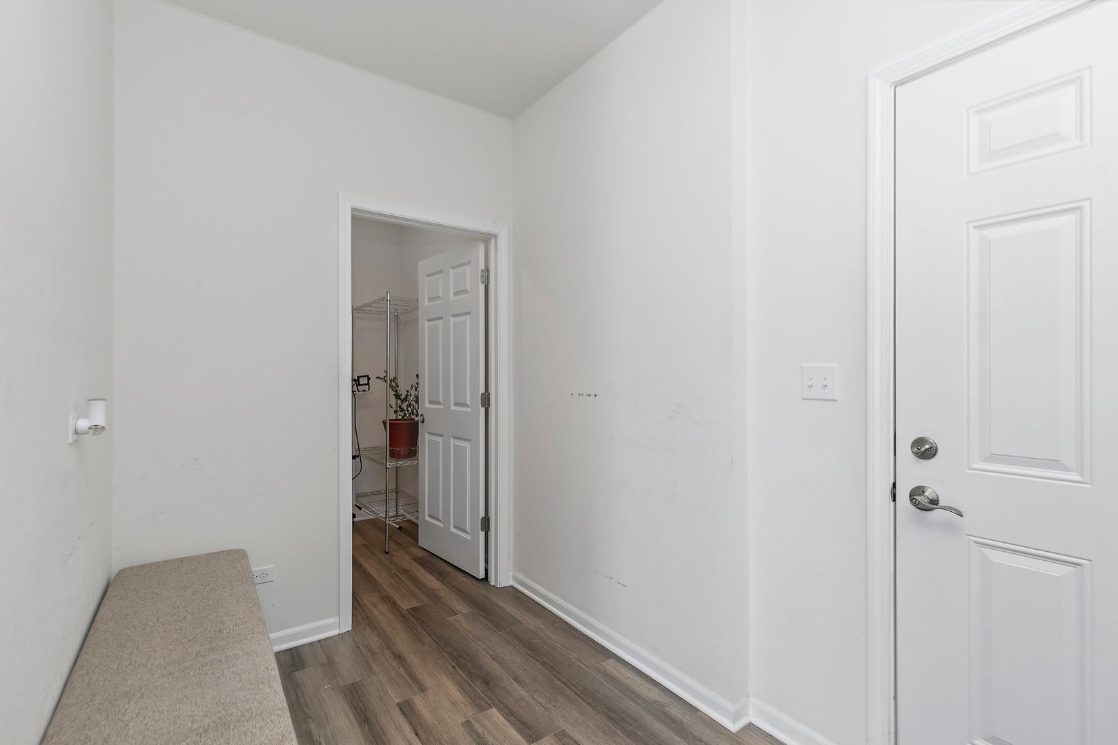 335 Snowdrop Lane Elgin, IL 60124 - Photo 13 of 25 a view of a hallway with wooden floor
