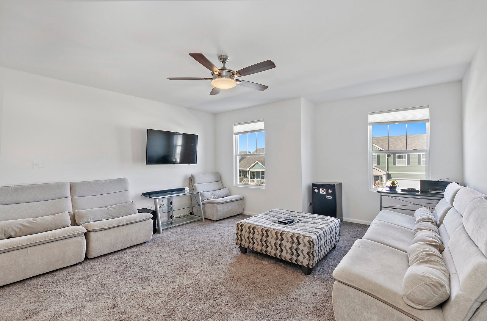 335 Snowdrop Lane Elgin, IL 60124 - Photo 14 of 25 a living room with furniture and a flat screen tv