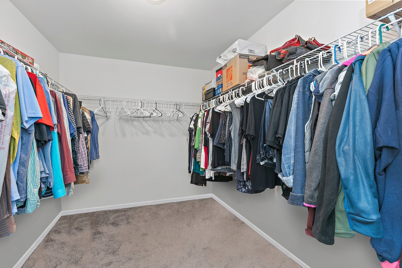 335 Snowdrop Lane Elgin, IL 60124 - Photo 19 of 25 a view of walk in closet with clothes