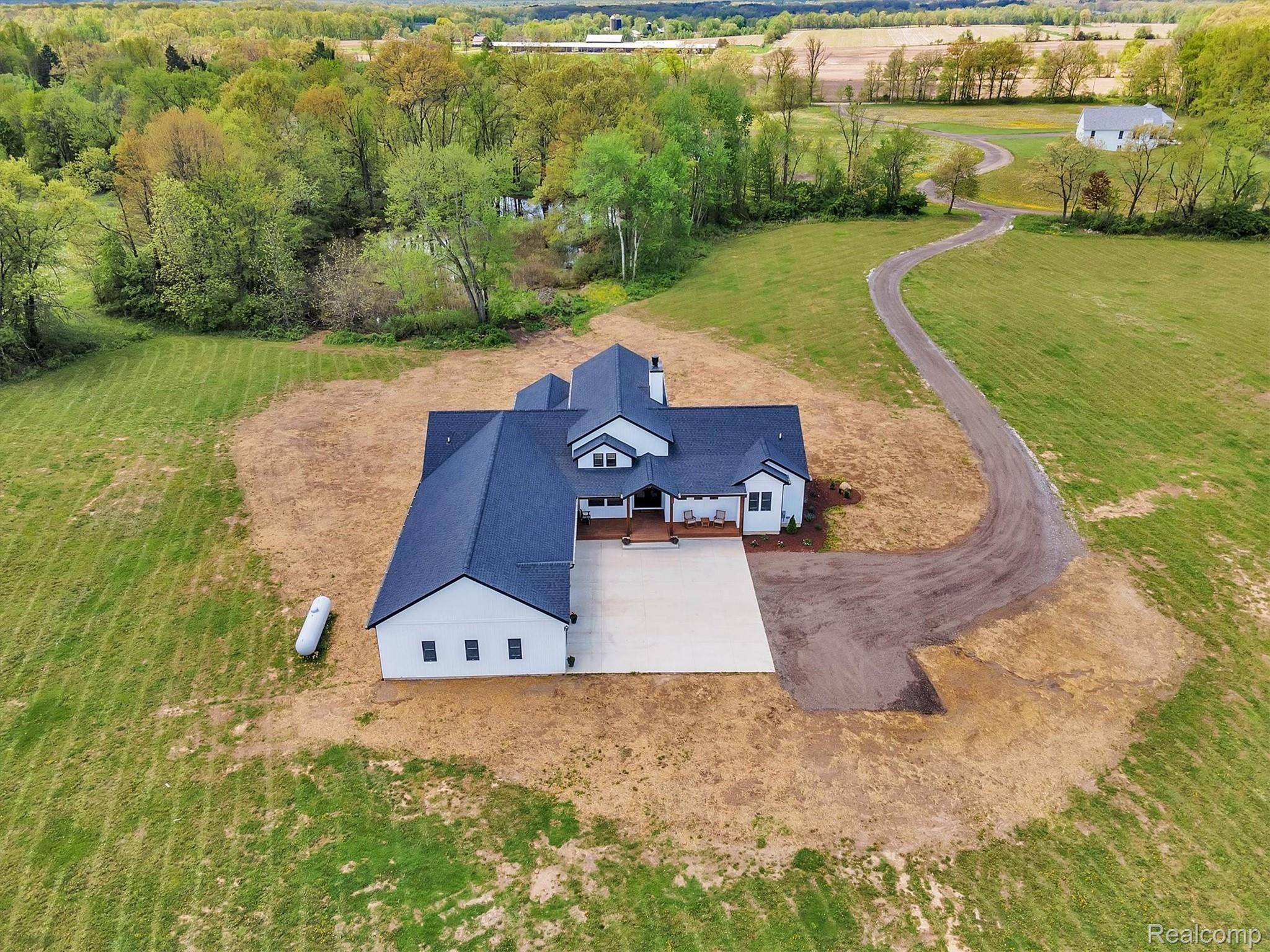 6100 Hartland Road Fenton, MI 48430 - Photo 63 of 67 Aerial view of home