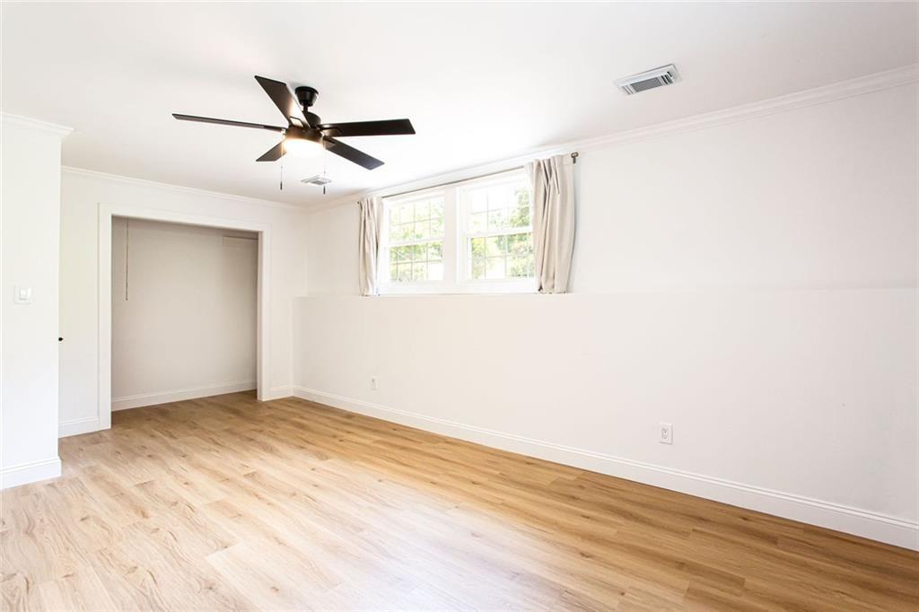 2814 Goodfellows Road Tucker, GA 30084 - Photo 34 of 46 a view of empty room with wooden floor and fan