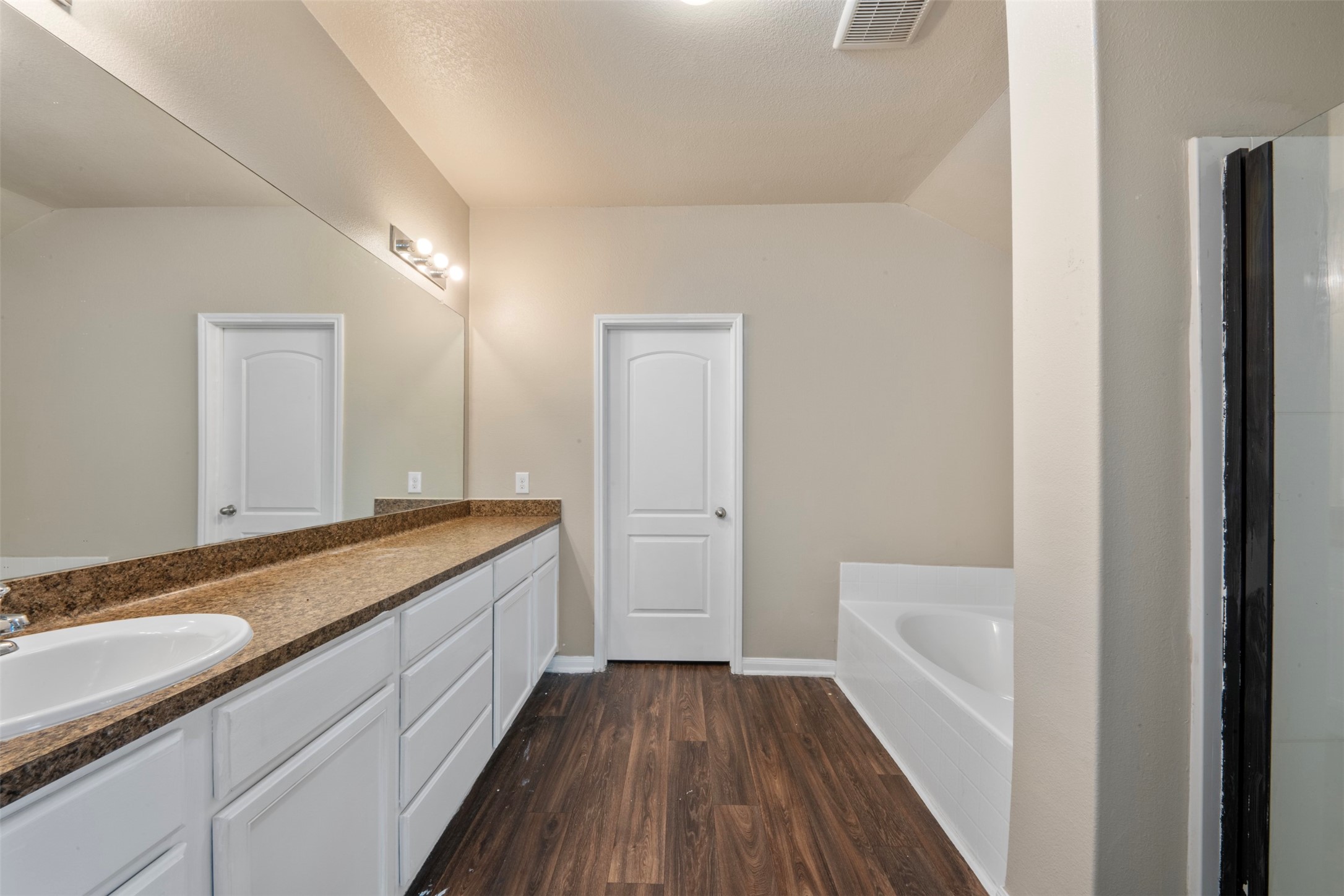 5926 Golden Cove Road Cove, TX 77523 - Photo 15 of 26 Primary bath with soaking tub and shower
