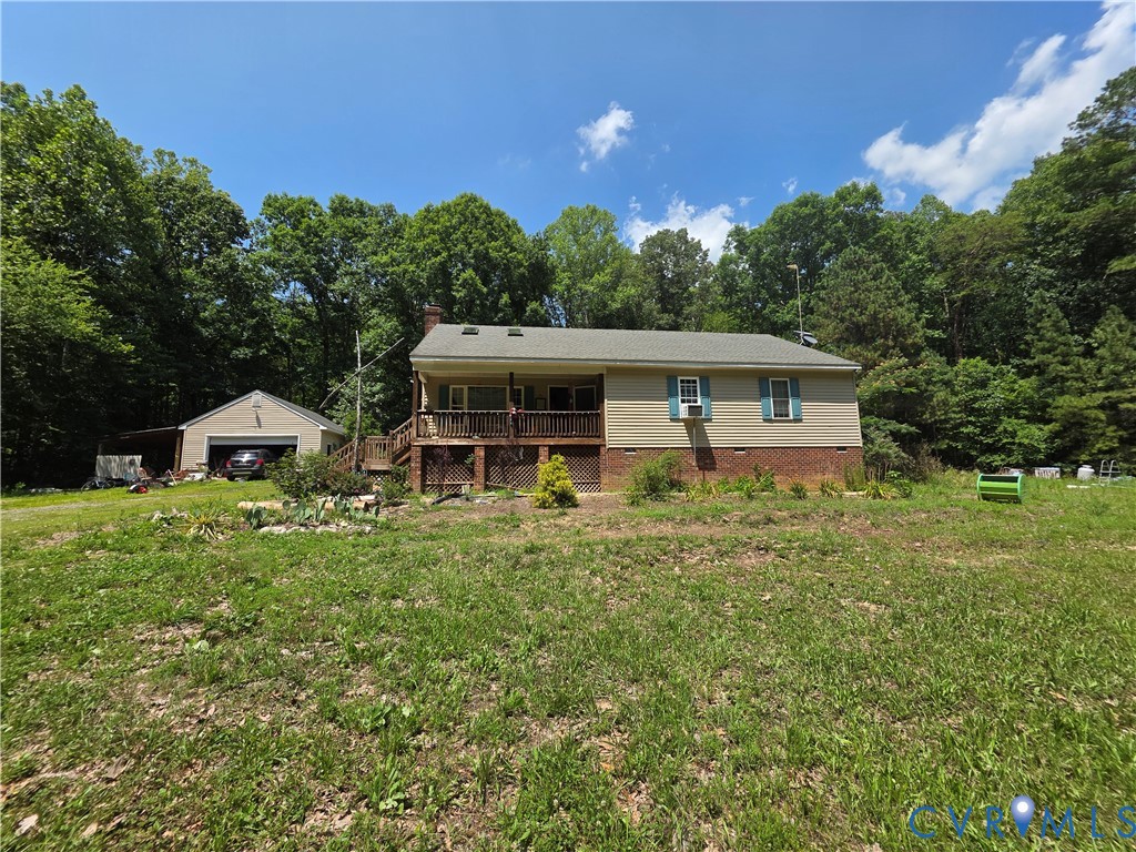 3161 Dorrell Road Aylett, VA 23009 - Photo 2 of 41 a front view of a house with a yard