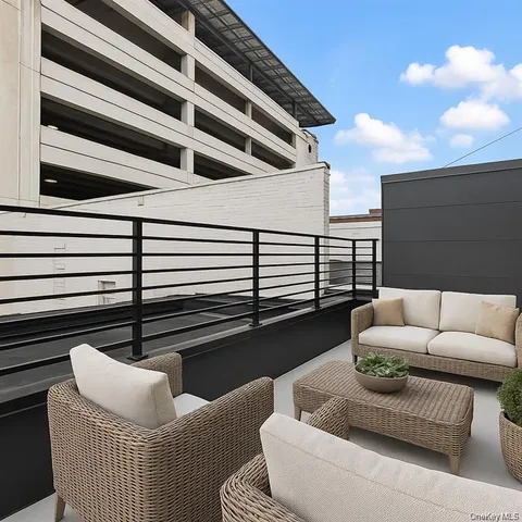 a roof deck with couch