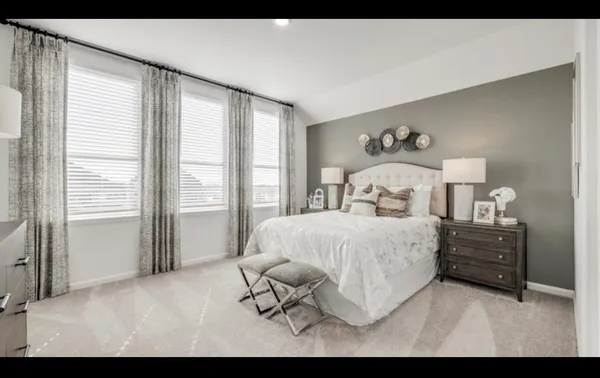 an aerial view of a house with outdoor space lake view and mountain view in back