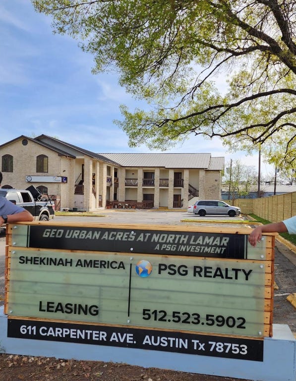611 Carpenter Avenue, Unit 201 Austin, TX 78753 - Photo 1 of 17 a front view of a building with a yard
