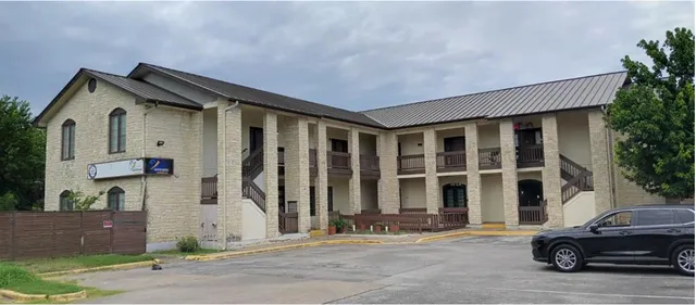 a car parked in front of a house