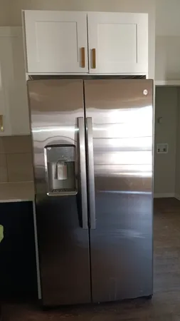 a close view of a refrigerator in kitchen