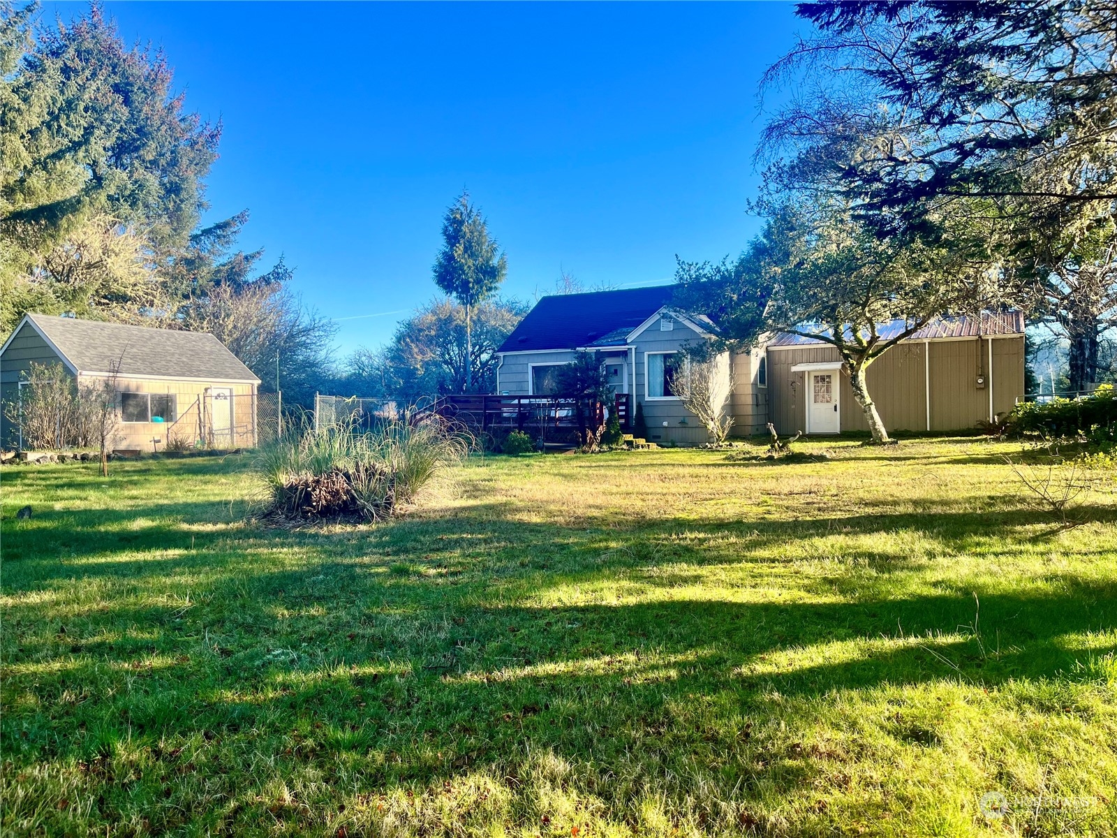 2998 Alexson Road Grayland, WA 98547 - Photo 1 of 27 a view of a house with a big yard