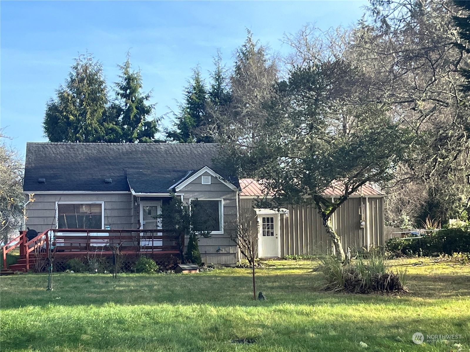 2998 Alexson Road Grayland, WA 98547 - Photo 20 of 27 a front view of a house with a garden