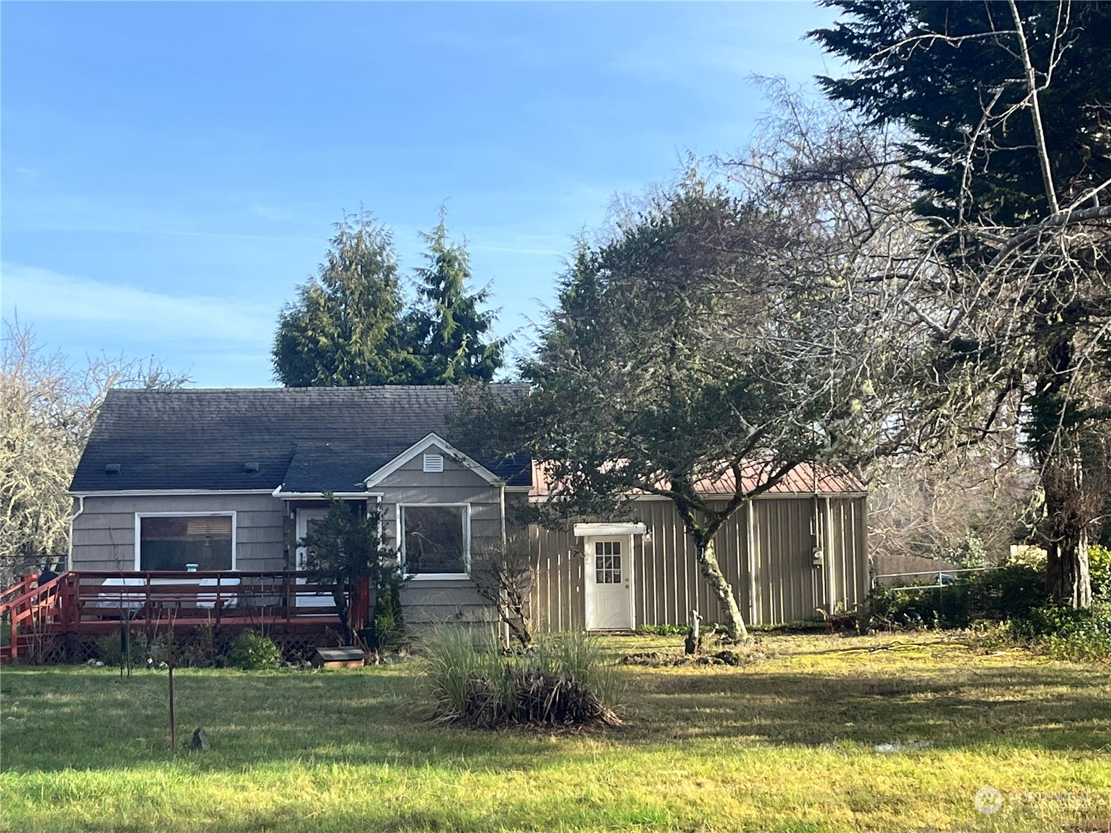 2998 Alexson Road Grayland, WA 98547 - Photo 2 of 27 a front view of house with yard and green space