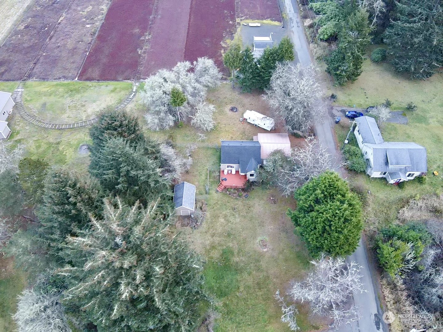 2998 Alexson Road Grayland, WA 98547 - Photo 22 of 27 an aerial view of a house with a yard