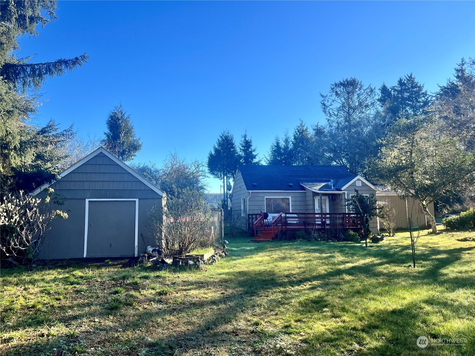 2998 Alexson Road Grayland, WA 98547 - Photo 27 of 27 a view of a house with a big yard