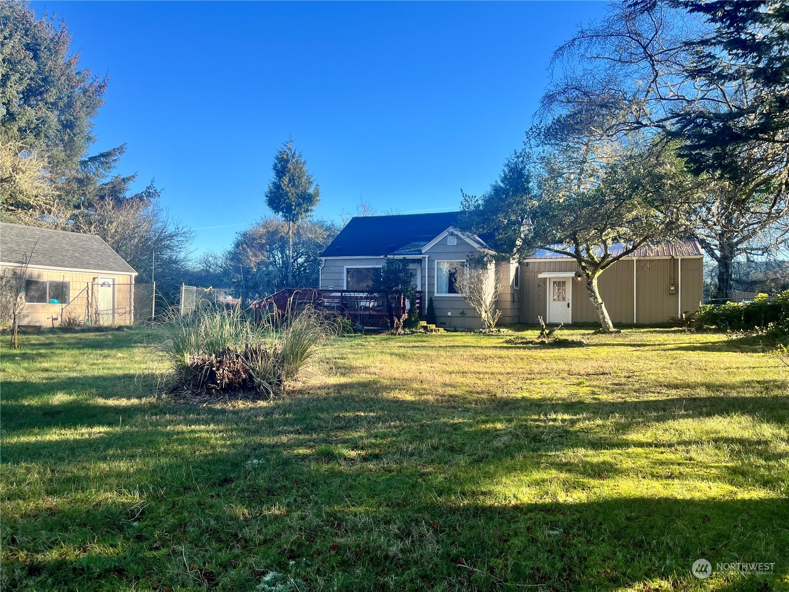 2998 Alexson Road Grayland, WA 98547 - Photo 5 of 27 a house view with swimming pool in front of it