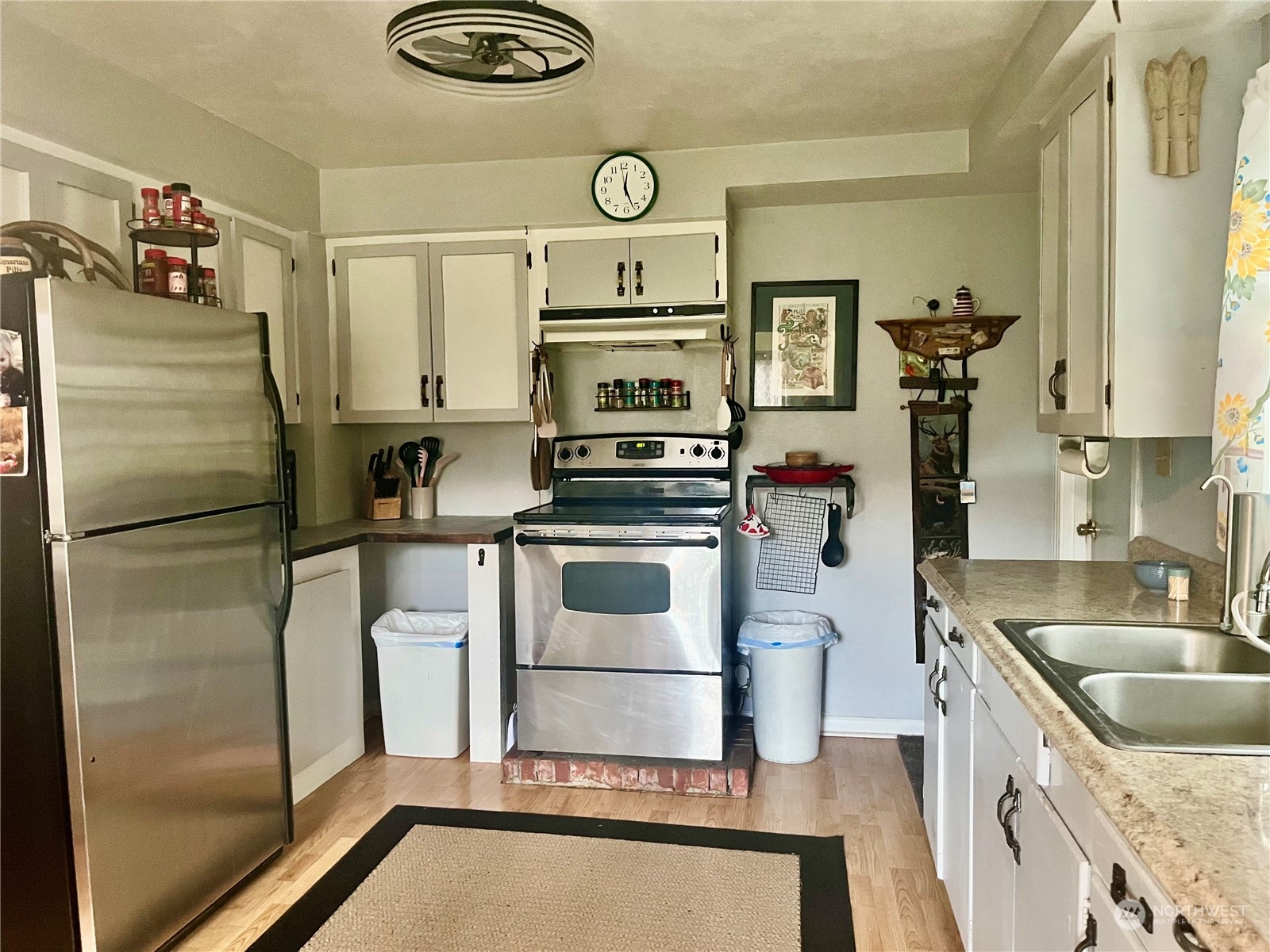 2998 Alexson Road Grayland, WA 98547 - Photo 10 of 27 a kitchen with a refrigerator sink and stove