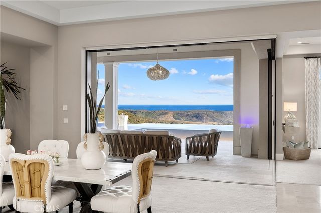 a living room with furniture and windows