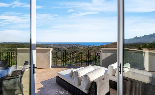 a view of swimming pool with a lounge chair