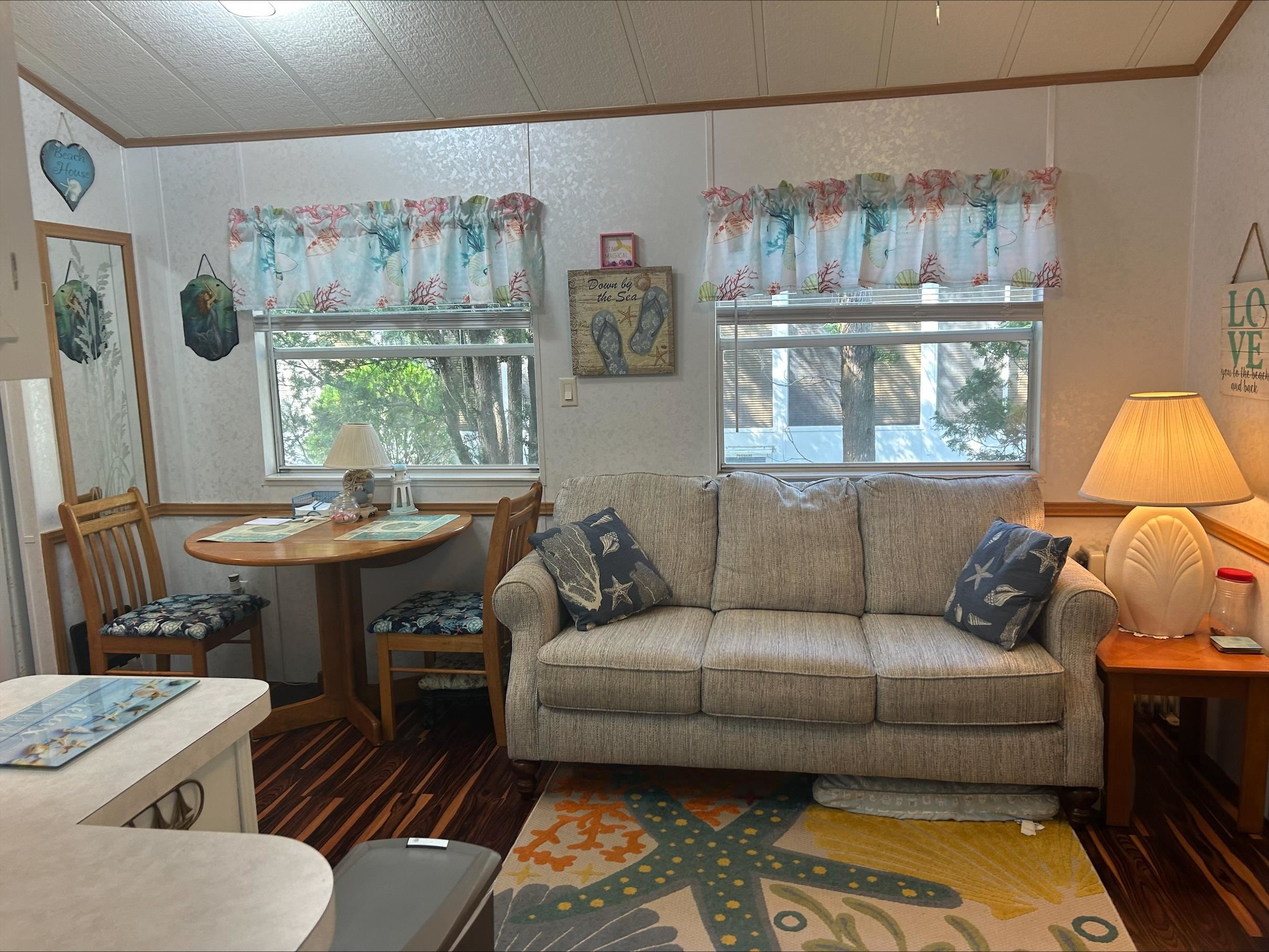709 Us Rt 9 S, Unit 623 Cape May, NJ 08204 - Photo 2 of 10 a living room with furniture and a window
