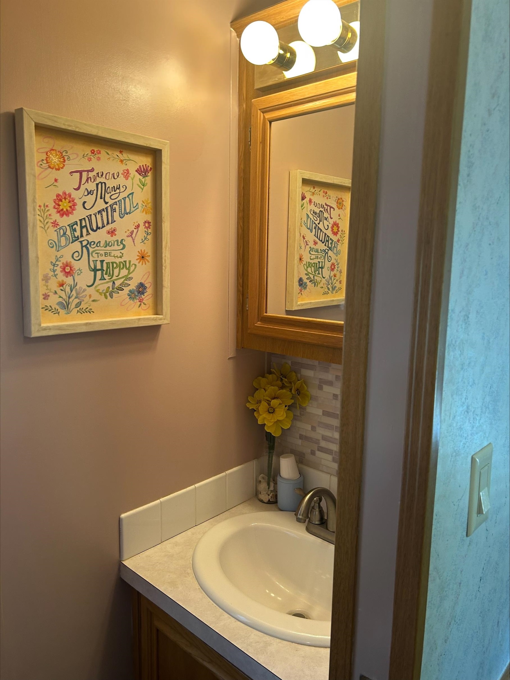 709 Us Rt 9 S, Unit 623 Cape May, NJ 08204 - Photo 6 of 10 a bathroom with a sink and a mirror