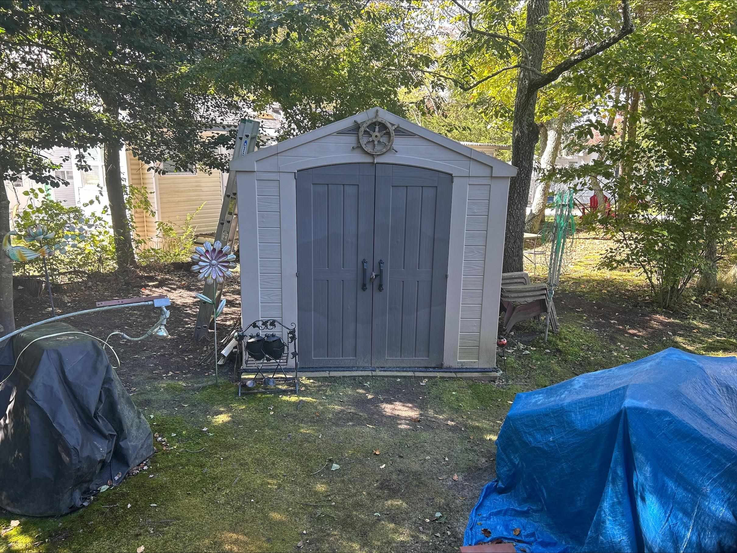 709 Us Rt 9 S, Unit 623 Cape May, NJ 08204 - Photo 10 of 10 a view of backyard with barn and wooden fence