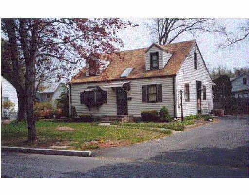 193 Draper Street Springfield, MA 01108 - Photo 1 of 1 a front view of a house with a yard