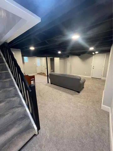 a bathroom with a sink and mirror