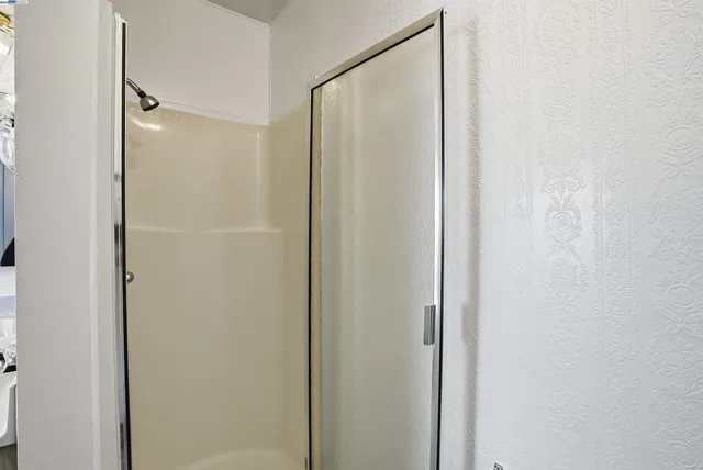a view of a bathroom with a shower