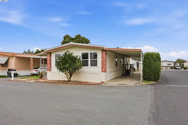 a view of a house with a patio