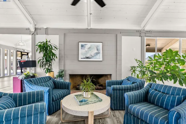 a view of a house with swimming pool and yard