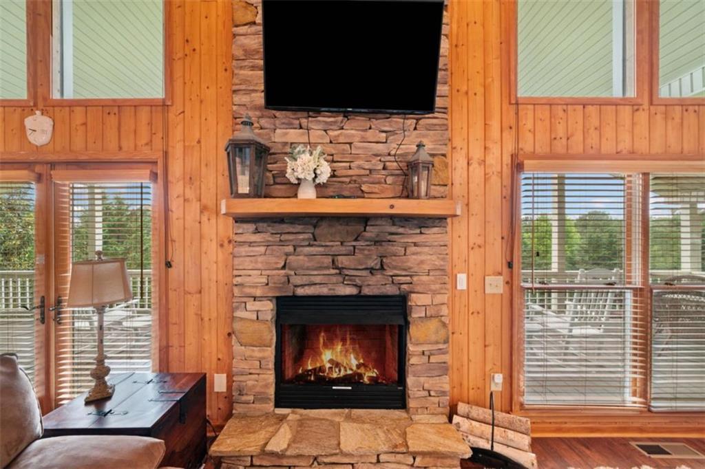 82 Emelia Road Morganton, GA 30560 - Photo 16 of 45 a living room with furniture and a fireplace