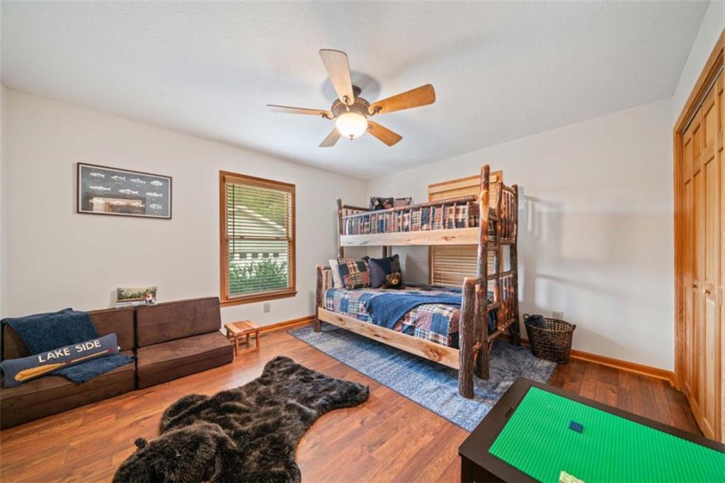 82 Emelia Road Morganton, GA 30560 - Photo 19 of 45 a bed room with a bed and a window