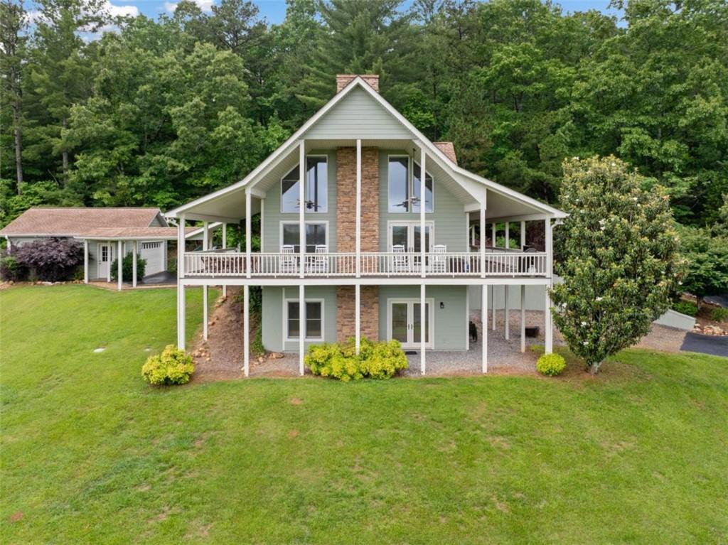 82 Emelia Road Morganton, GA 30560 - Photo 2 of 45 a front view of a house with garden
