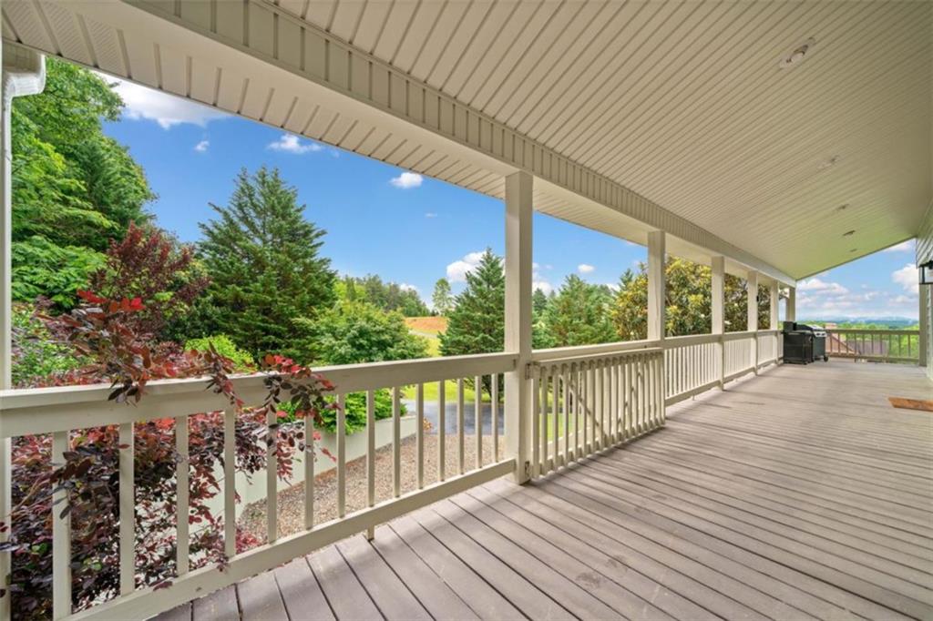 82 Emelia Road Morganton, GA 30560 - Photo 39 of 45 a view of a balcony with wooden floor