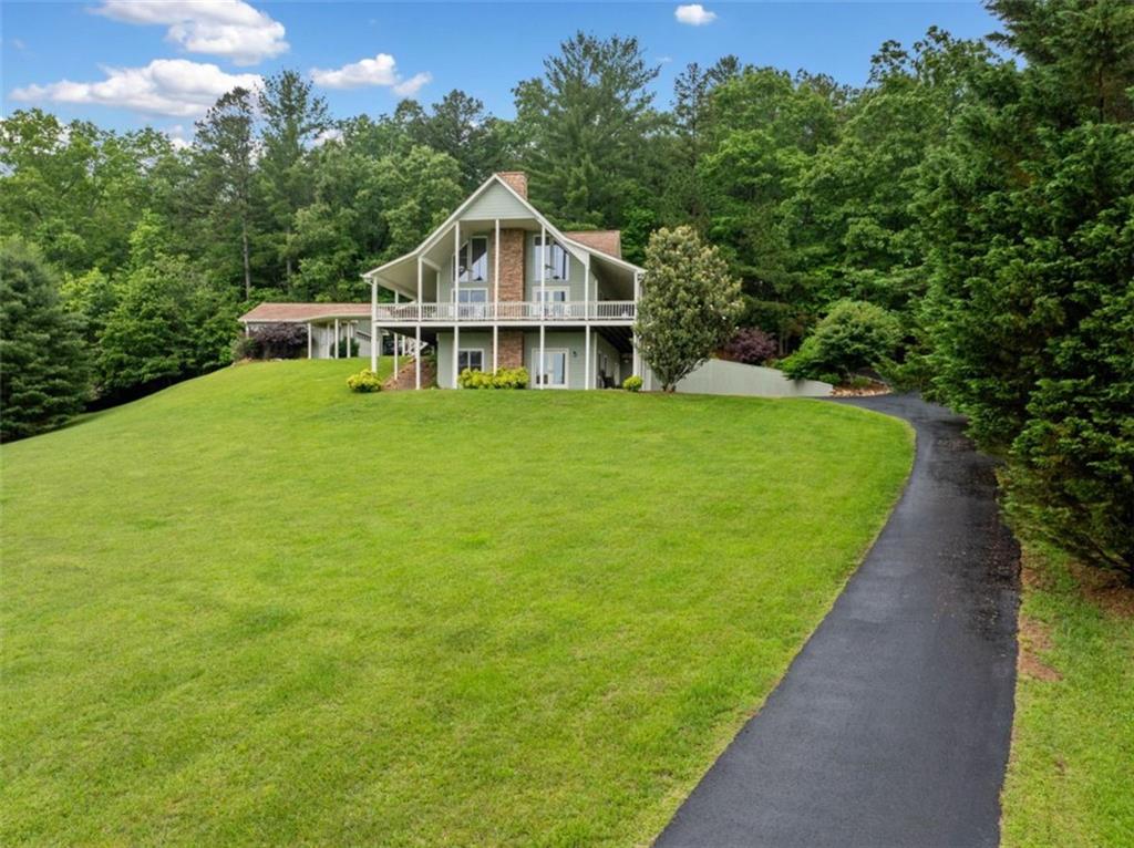 82 Emelia Road Morganton, GA 30560 - Photo 44 of 45 a front view of a house with a yard