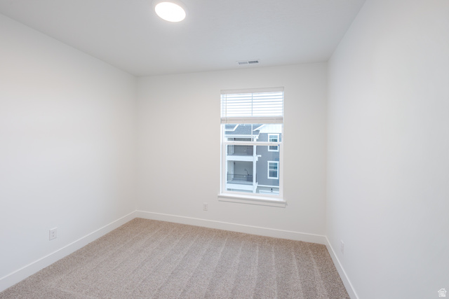 4661 Poplar Way, Unit R304 Mapleton, UT 84664 - Photo 5 of 17 Unfurnished room with light colored carpet and baseboards